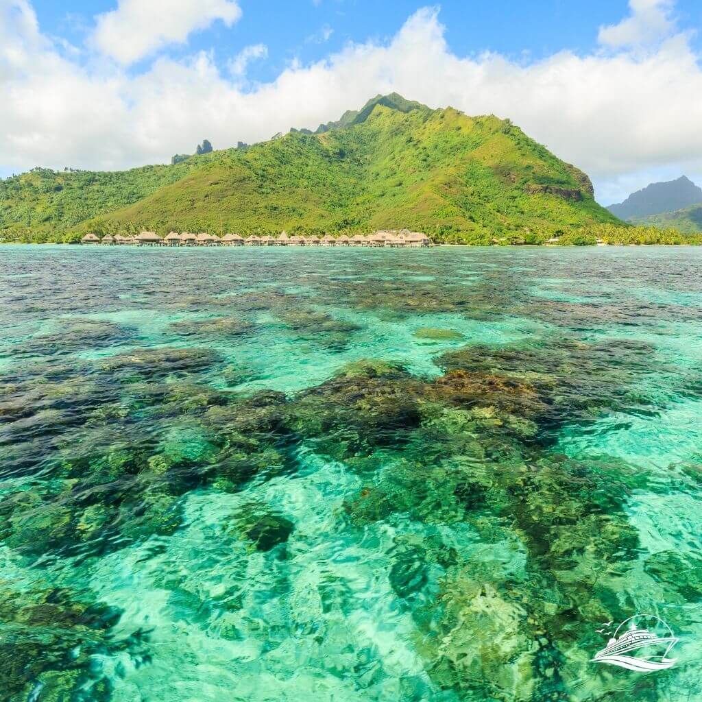 FRENCH POLYNESIA PAPEETE Beautiful sea with mountain and resort background in Moorae Island at Tahiti